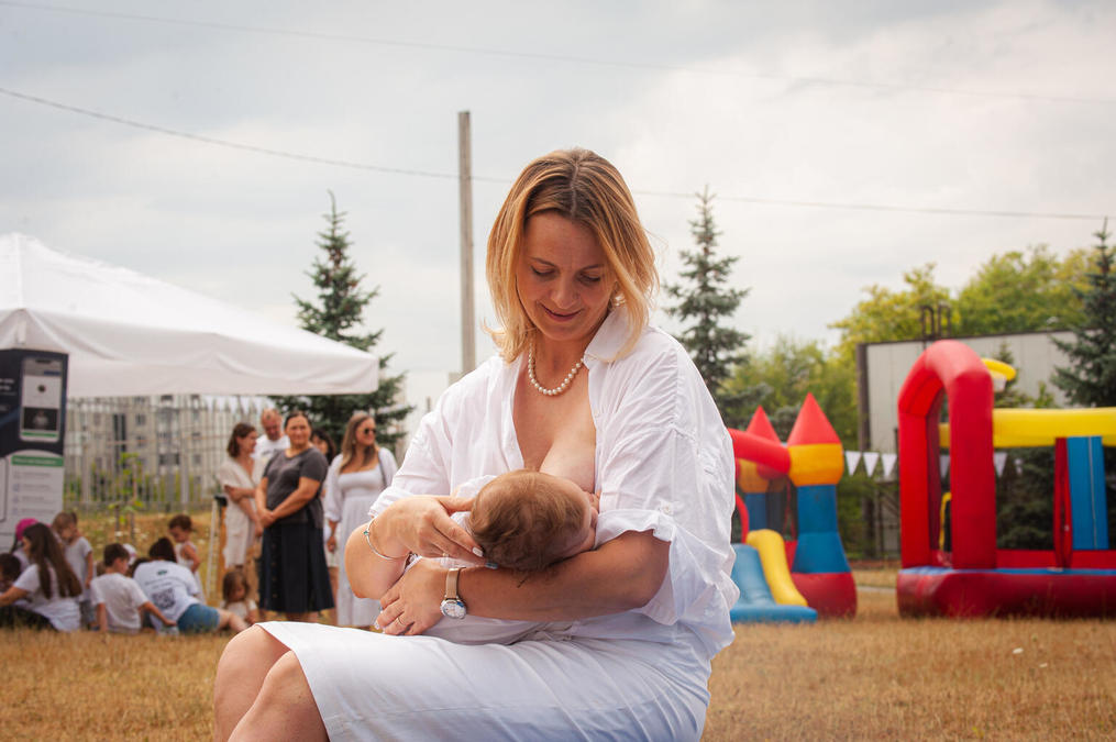Women sit breastfeeding